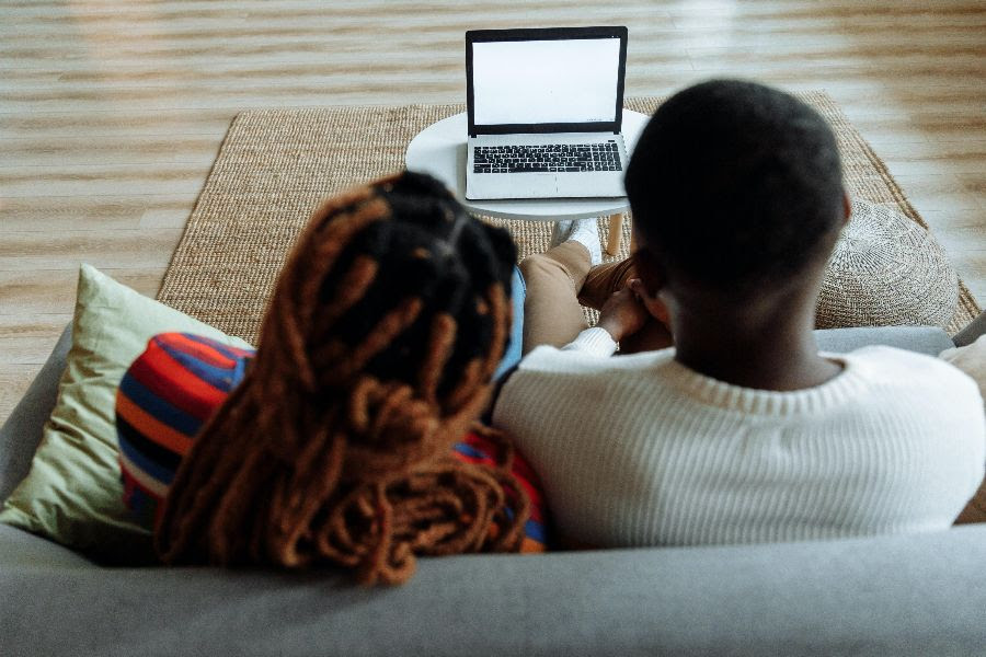 Licensed therapist at Let's Talk Psychological Wellness conducting a HIPAA-compliant online teletherapy session with a client in New York, New Jersey, or Florida