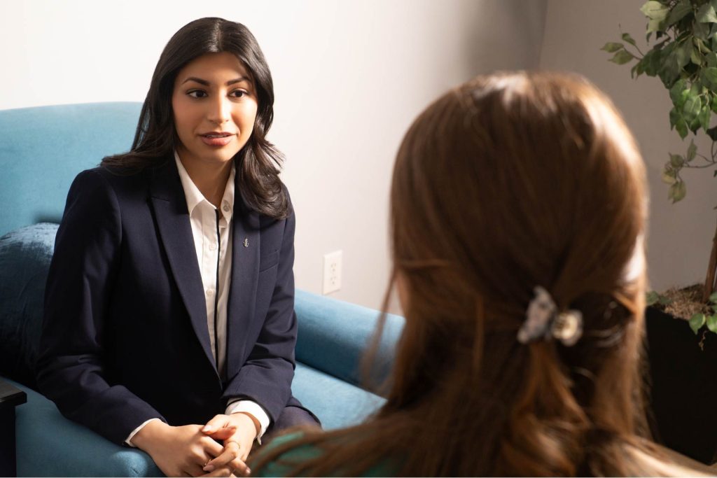 Person sitting quietly, experiencing depression symptoms — Let's Talk therapists in New York help clients with MDD, postpartum depression, and persistent depression using evidence-based treatment